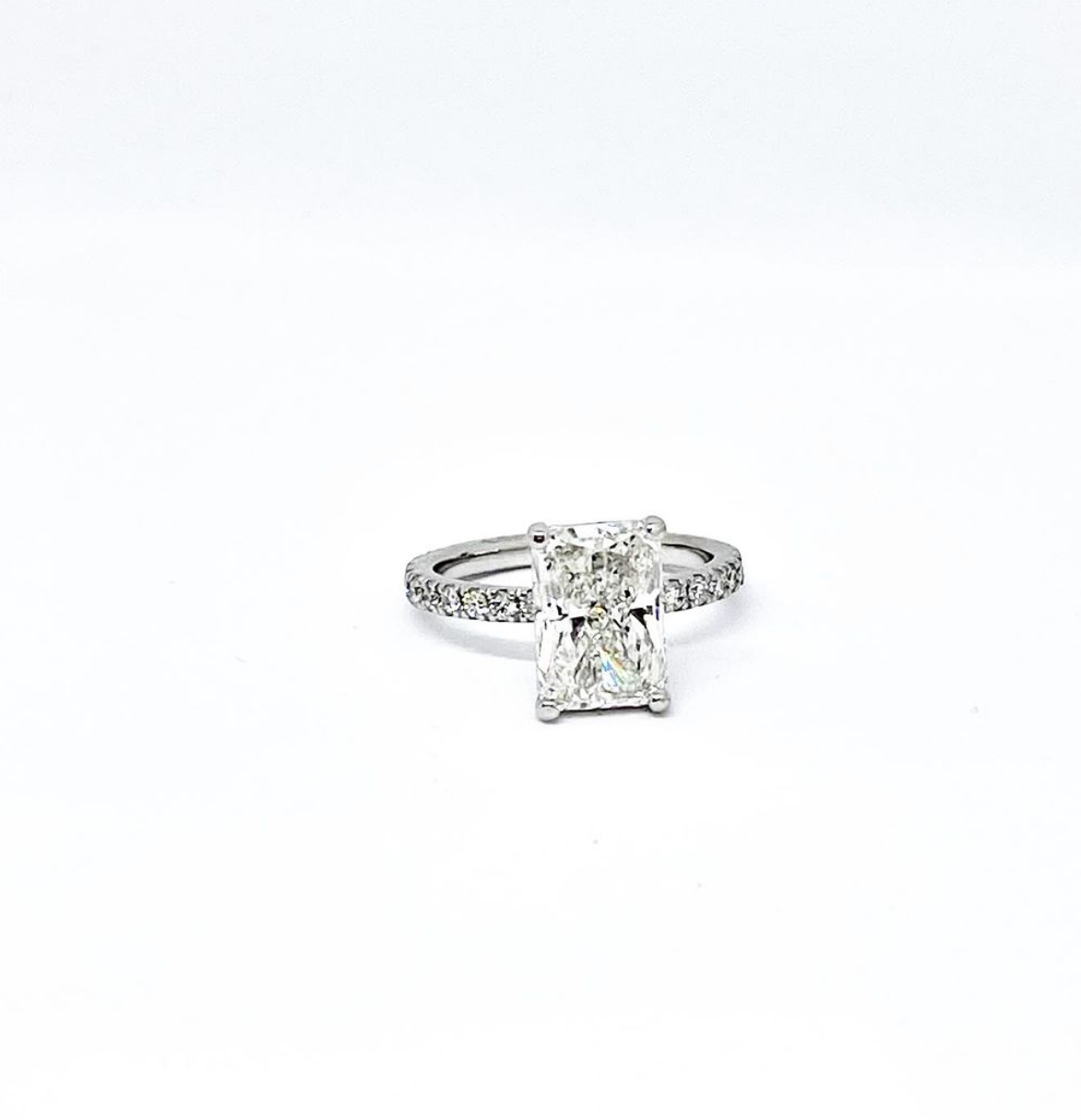Radiant, Rectangle (Long Way) Diamond with Diamond Prong Band against white background 