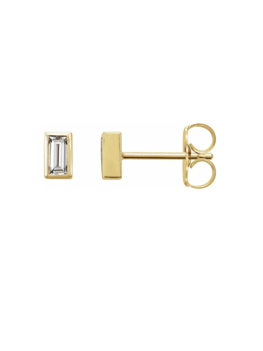 gold diamond earring on white background